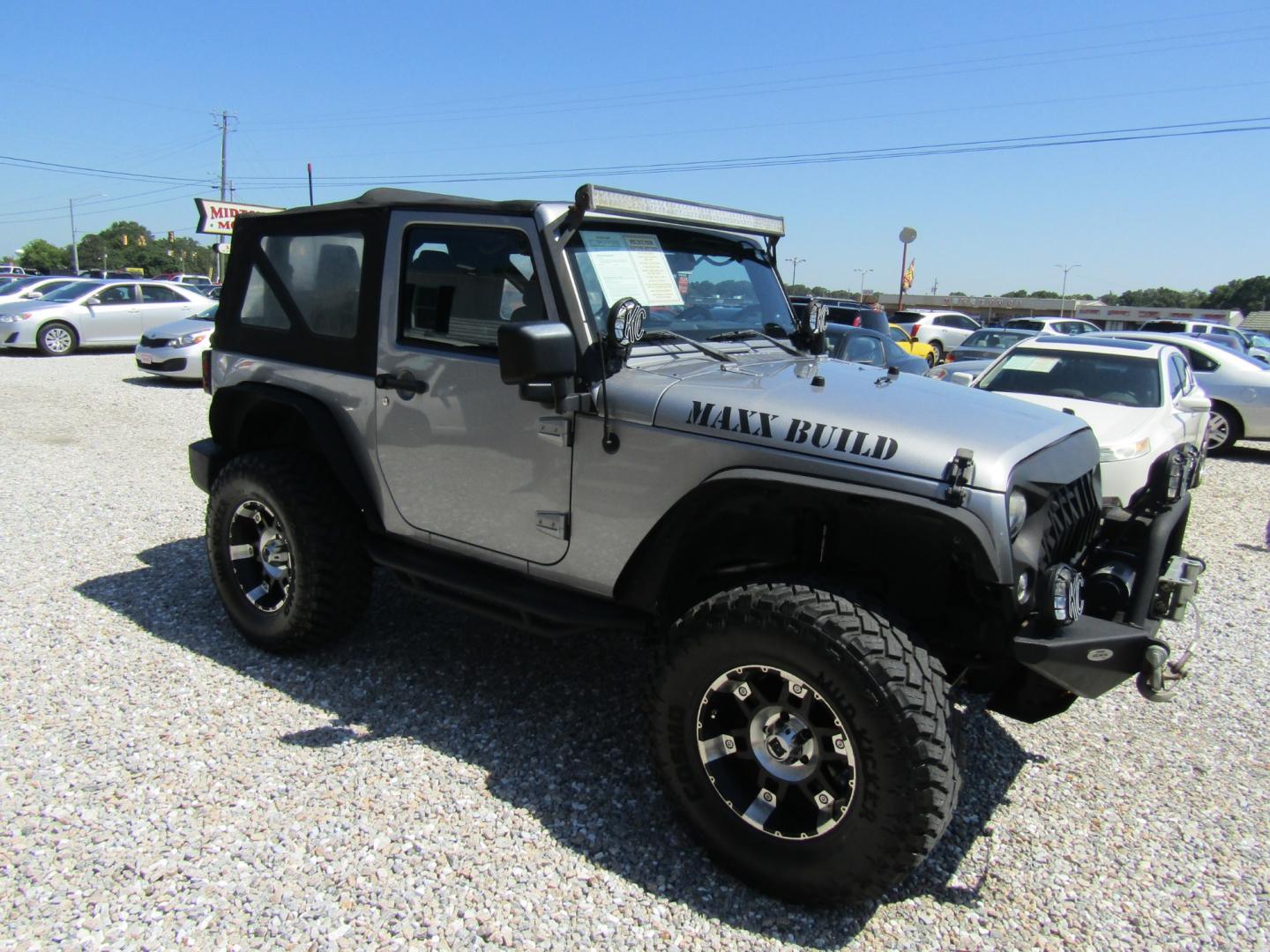 2014 Silver /Gray Jeep Wrangler Sport 4WD (1C4AJWAG5EL) with an 3.6L V6 DOHC 24V FFV engine, Automatic transmission, located at 15016 S Hwy 231, Midland City, AL, 36350, (334) 983-3001, 31.306210, -85.495277 - Photo#0